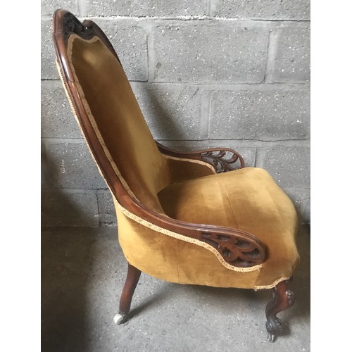 1309 - A Victorian nursing chair with carved frame and cabriole legs. Height to seat 40cm, to back 98cm, wi... 