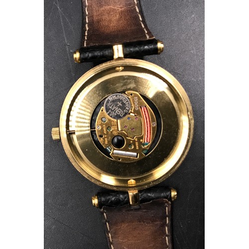 636 - A Gentleman's Gucci gold plated wristwatch with Roman numeral face and leather strap. Case size 3.5c... 