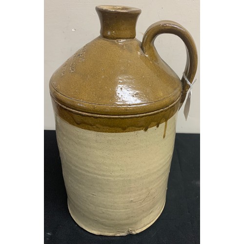 13 - A stoneware jar with R.L Swallow Wines and Spirit merchant Nine Elms Tavern to front. 35cms h.