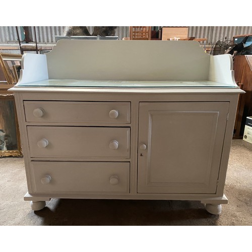 1289 - A painted pine dresser, 3 drawers to one side and door to the other, upstand to back. 126cms w x 50c... 