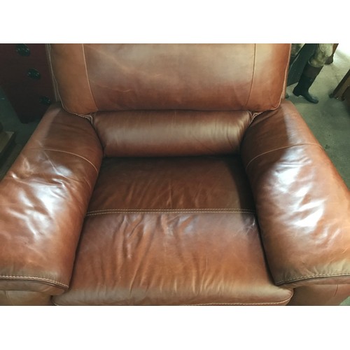 1300 - An Italian made brown leather chunky armchair. Height to seat 48cm, to back approx. 100cm, width 120... 