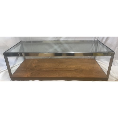 1312 - A Merrow Associates chrome framed glass top coffee table with rosewood undershelf by Richard Young. ... 