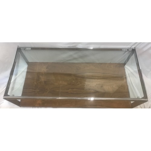 1312 - A Merrow Associates chrome framed glass top coffee table with rosewood undershelf by Richard Young. ... 