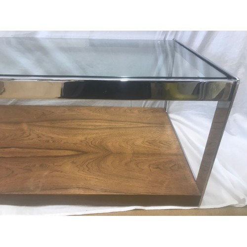 1312 - A Merrow Associates chrome framed glass top coffee table with rosewood undershelf by Richard Young. ... 