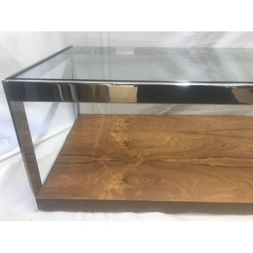 1312 - A Merrow Associates chrome framed glass top coffee table with rosewood undershelf by Richard Young. ... 