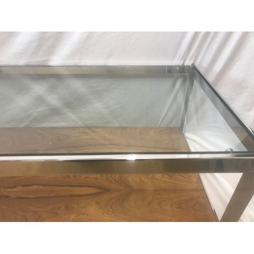 1312 - A Merrow Associates chrome framed glass top coffee table with rosewood undershelf by Richard Young. ... 