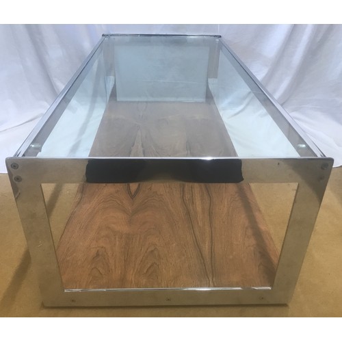 1312 - A Merrow Associates chrome framed glass top coffee table with rosewood undershelf by Richard Young. ... 