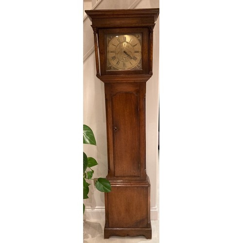 677 - An oak longcase clock with a square brass dial inscribed E Foster, Carlisle, roman numerals and date... 