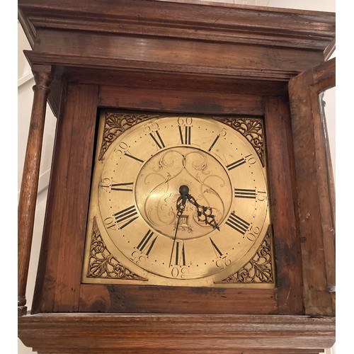 677 - An oak longcase clock with a square brass dial inscribed E Foster, Carlisle, roman numerals and date... 