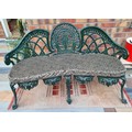A heavy metal green garden bench. 46cms height to seat, height to back 82cms, 124cms w x 61cms d.