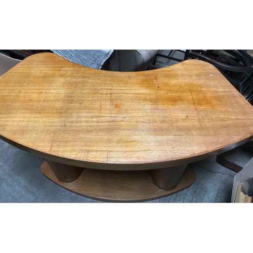 1319 - An oak altar table with curved front and back and kidney shaped top. Width approx 154cm x 92cm h.