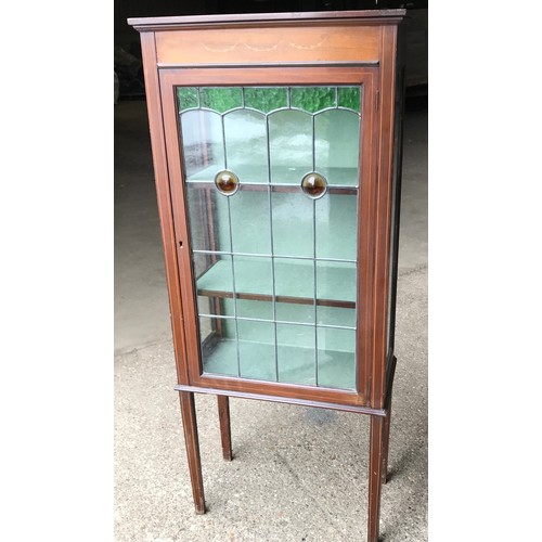 1190C - A single door display cabinet with leaded coloured glass. 61 w x 30 d x 149cms h.