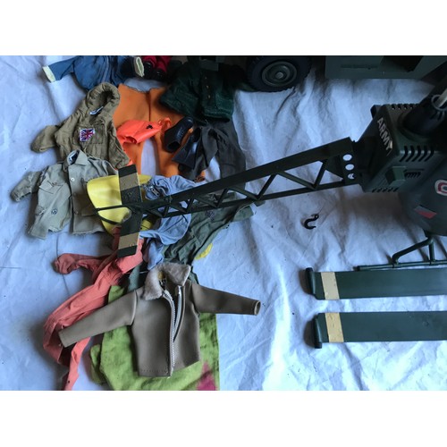 407 - Action Man Toys, Jeep, Helicopter, Tank Clothing & one Action Figure.