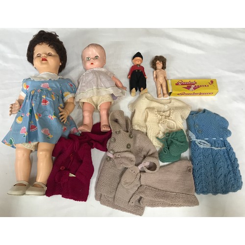 492 - Plastic dolls and clothing to include a B.N.D doll 53cms h, small B.N.D doll 32cms h, small Rosebud ... 