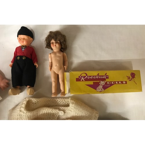 492 - Plastic dolls and clothing to include a B.N.D doll 53cms h, small B.N.D doll 32cms h, small Rosebud ... 