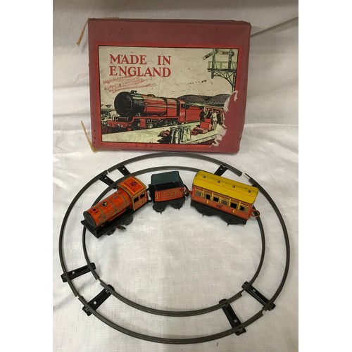 491 - Brimtoys tin plate train set, no. 321'Cock o the North' LNER with track and box, working mechanism.