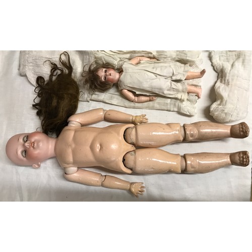 493 - Armand Marseille pot headed doll with composite body, model no. 390, 62cms h together with a small G... 