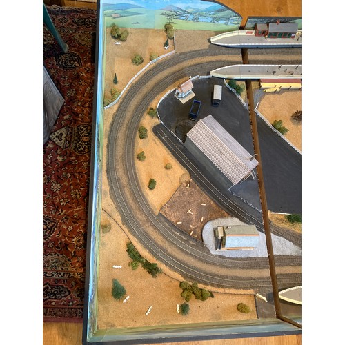 499 - A large custom built electric train track 187 x 125cm with scenery in 3 sections, a boxed Hornby OO ... 