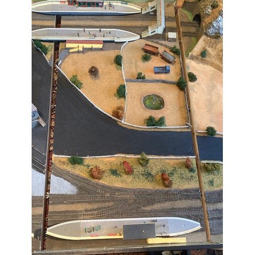 499 - A large custom built electric train track 187 x 125cm with scenery in 3 sections, a boxed Hornby OO ... 