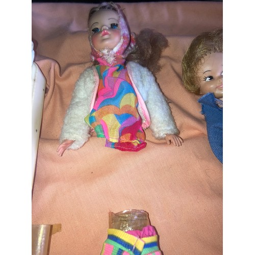 410 - Plastic dolls, Sindy Wardrobe, Bed, Jeep, Clothing, Sweet April Carry Case Wardrobe & Cot.