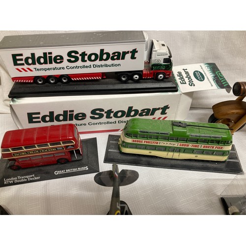 501 - A mixed lot of toys to include Atlas Edition Eddie Stobart lorry, wooden and metal motorcycle, dieca... 