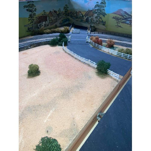 499 - A large custom built electric train track 187 x 125cm with scenery in 3 sections, a boxed Hornby OO ... 