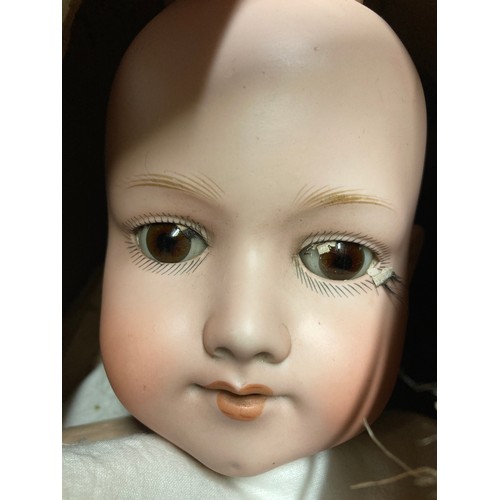 493 - Armand Marseille pot headed doll with composite body, model no. 390, 62cms h together with a small G... 