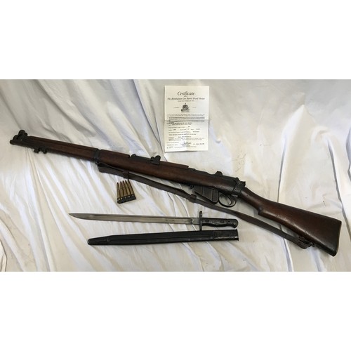 670 - A Lee Enfield SMLE Number 1 MKIII 303 rifle deactivated, number W3802 with a 1907 leather sheathed b...