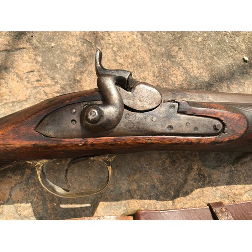 683 - A .550 percussion (converted from flintlock) shotgun 35.75'' barrel, Brass trigger guard, brass on b... 