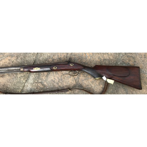 683 - A .550 percussion (converted from flintlock) shotgun 35.75'' barrel, Brass trigger guard, brass on b... 