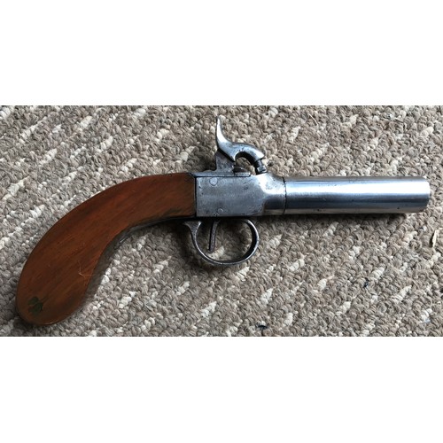 686 - Percussion single barrel pistol, turn off barrel, 6.5cms, marked to barrel, wooden grip, overall len... 