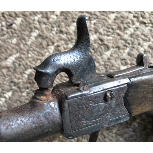 690 - Flintlock pistol, markings under barrel, folding trigger, dolphin pull lever, engraved to sides. Yor... 