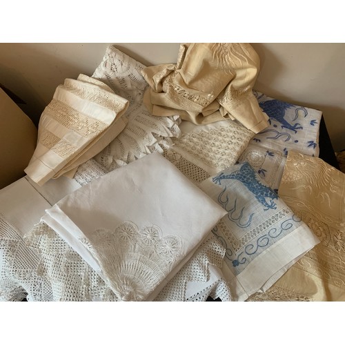 468 - A quantity of good quality hand embroidered table cloths to include Chinese silk crocheted etc.