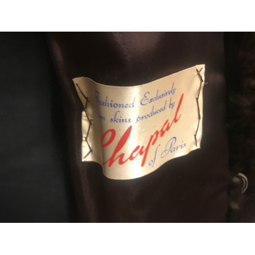 469 - A mid length Canadian squirrel coat with label 