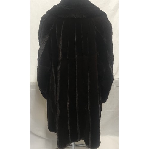 469 - A mid length Canadian squirrel coat with label 