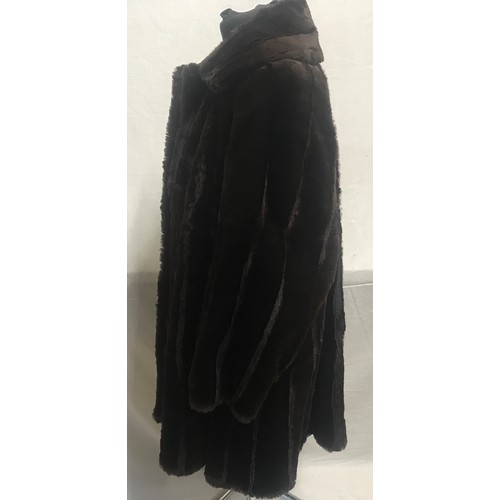 469 - A mid length Canadian squirrel coat with label 