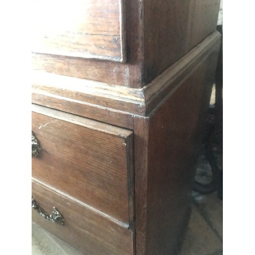 1228 - An 18thC oak chest on chest, two short drawers on bracket feet. 100 w base x 52 d x 167cms h.