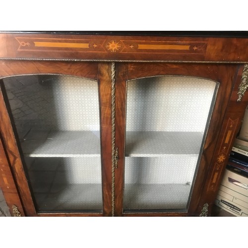 1229 - Walnut inlaid display cabinet with decorative brass mounts. 108 w 33 d x 105cm h.