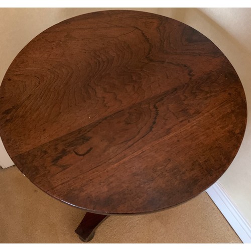 1241 - A rosewood occasional table. 53 d x 73 cm h.