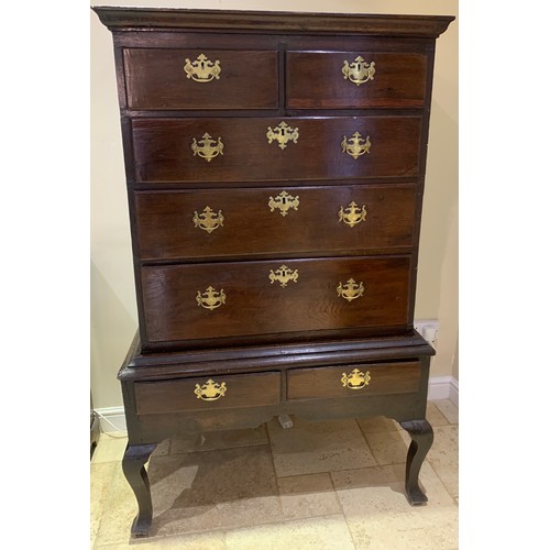 1248 - An oak chest on stand. 157 x 94cm.