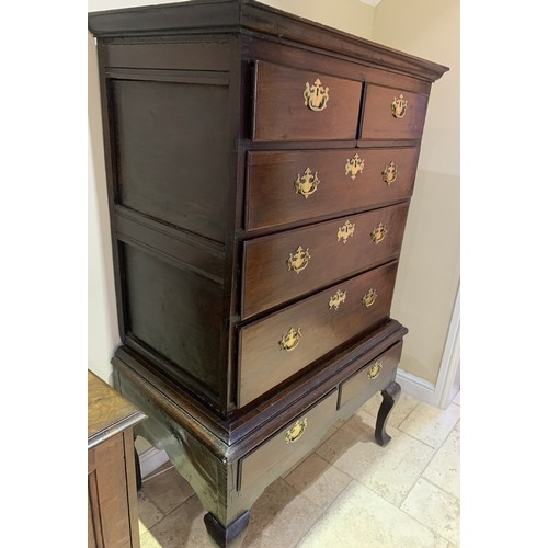 1248 - An oak chest on stand. 157 x 94cm.