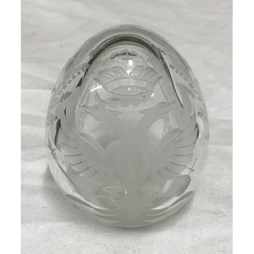 189 - A clear cut glass Faberge egg with sticker to bottom. 6 h x 5cm w.