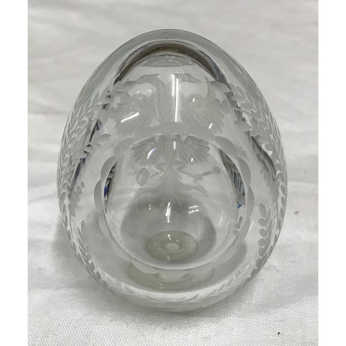 189 - A clear cut glass Faberge egg with sticker to bottom. 6 h x 5cm w.