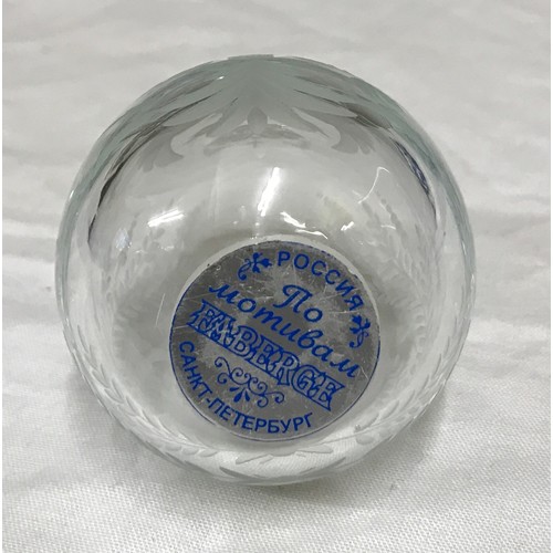 189 - A clear cut glass Faberge egg with sticker to bottom. 6 h x 5cm w.