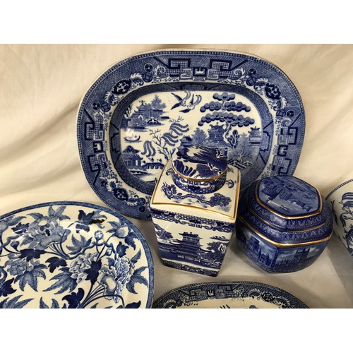 191 - A selection of blue and white pottery to include Willow pattern meat plates 27 and 18cm, dinner plat... 