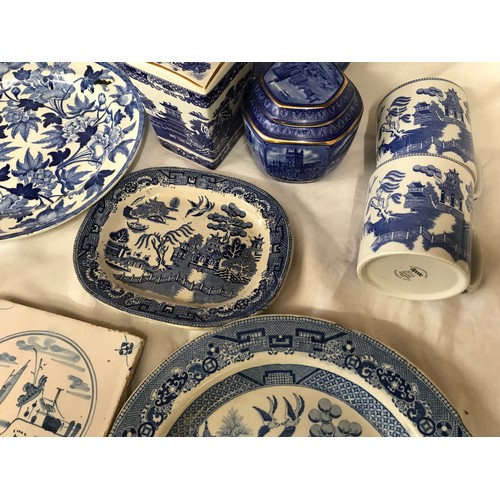 191 - A selection of blue and white pottery to include Willow pattern meat plates 27 and 18cm, dinner plat... 