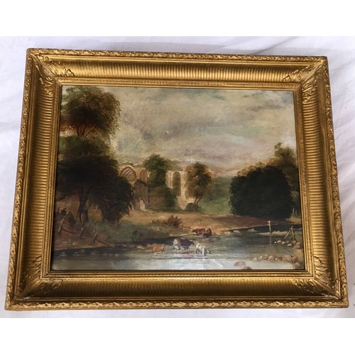 1067 - Oil on canvas of country scene with church ruins and cattle on a river bank in a gilt frame. 34.5 x ... 