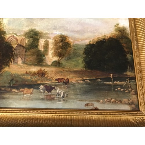 1067 - Oil on canvas of country scene with church ruins and cattle on a river bank in a gilt frame. 34.5 x ... 