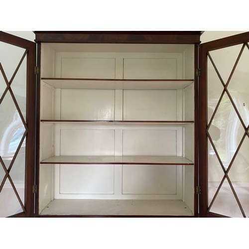 1252 - An Edwardian display cabinet with 2 glazed doors to top and 2 drawers to base on square tapered legs... 