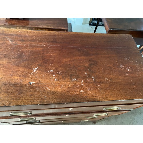 1253 - A mahogany 19thC chest of drawers on splayed bracket feet with 4 long drawers, brass handles and ivo... 